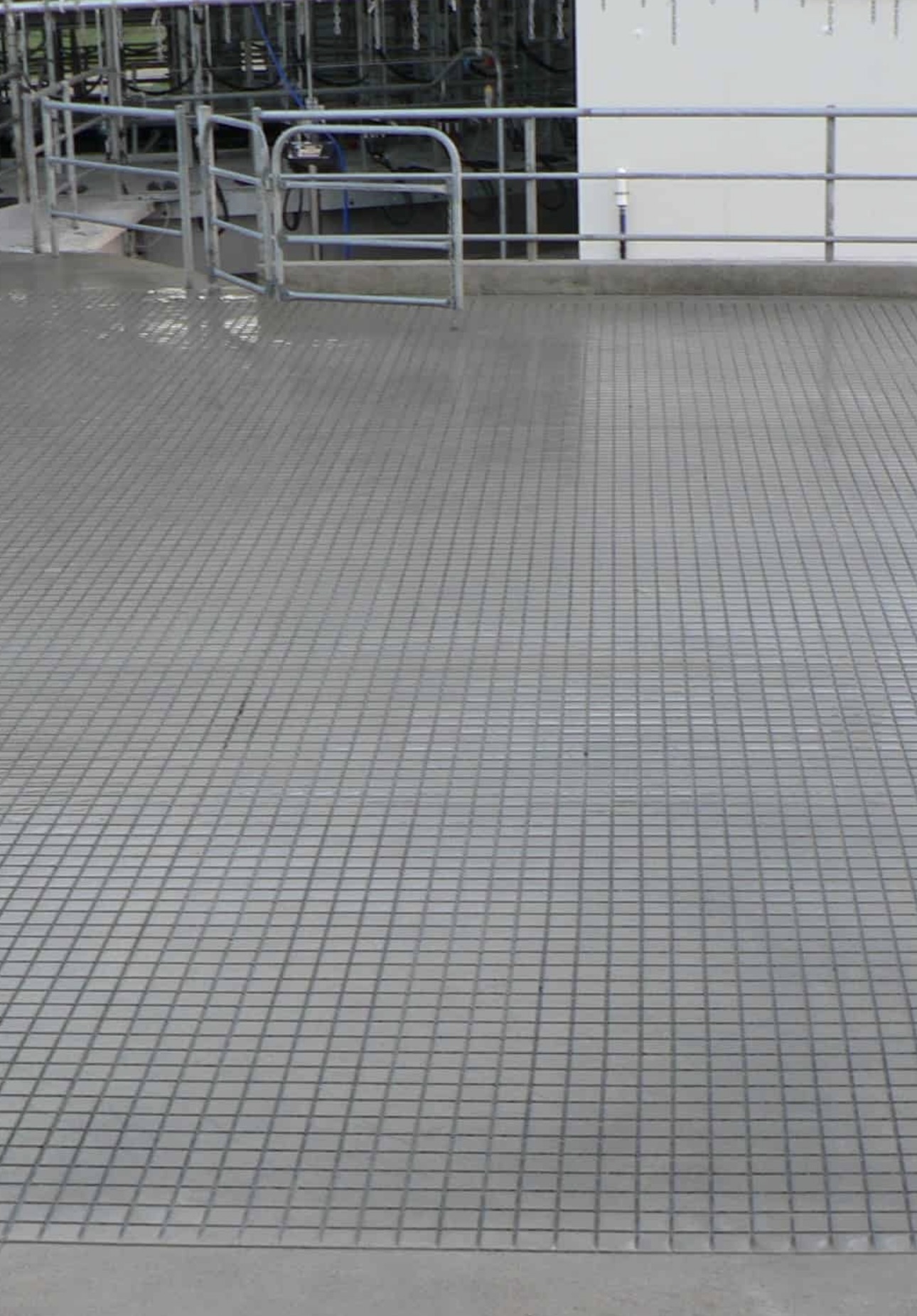 Wet-cut anti-slip concrete grooving in progress